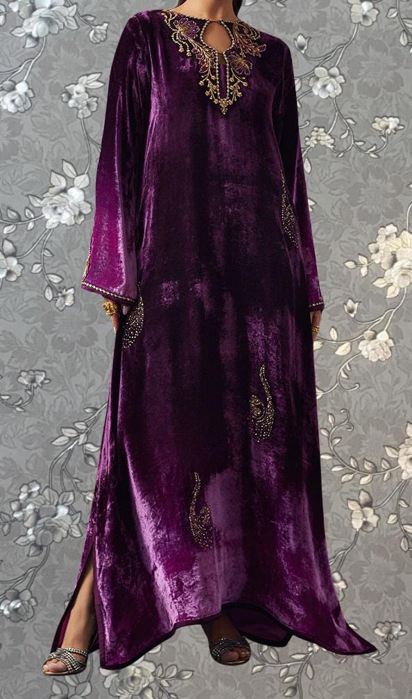 A long, purple velvet dress with gold embroidery and floral patterns.