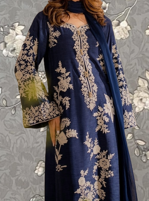 A woman wearing a blue dress with intricate embroidered patterns on the sleeves and hem.